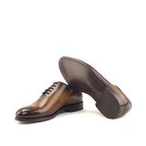 Gentlemen Wholecut with Hand Painted Cognac Patina in Calf Leather with Goodyear Welt